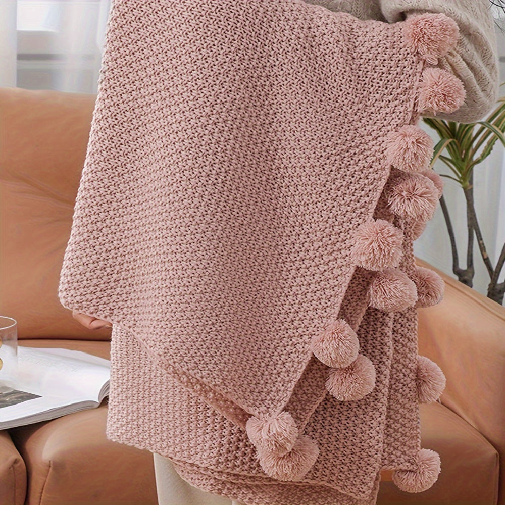 Pomora Throw - Strickdecke mit Pom-Pom-Besatz