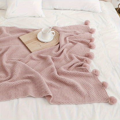 Pomora Throw - Strickdecke mit Pom-Pom-Besatz