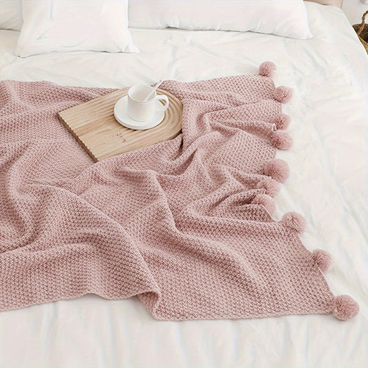 Pomora Throw - Strickdecke mit Pom-Pom-Besatz