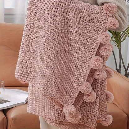 Pomora Throw - Strickdecke mit Pom-Pom-Besatz
